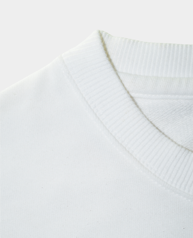 RAVVIX Oversized White “Wave” Tee – Minimal Streetwear with a Bold Artistic Touch